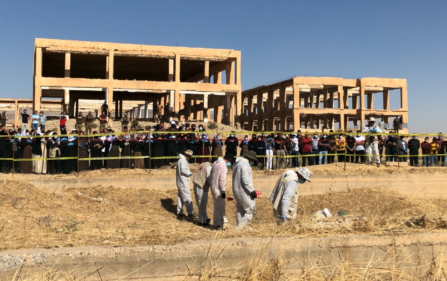 A forensic team trawls through a mass grave site in Solagh, Shingal on October 24, 2020. Photo: Fazel Hawramy/ Rudaw